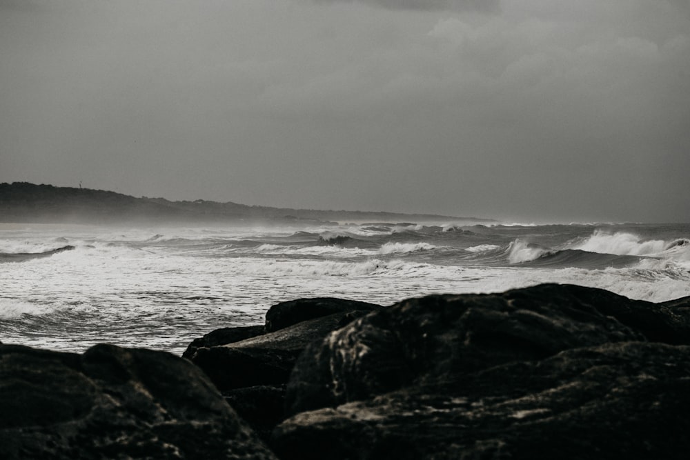 grayscale photo of sea waves