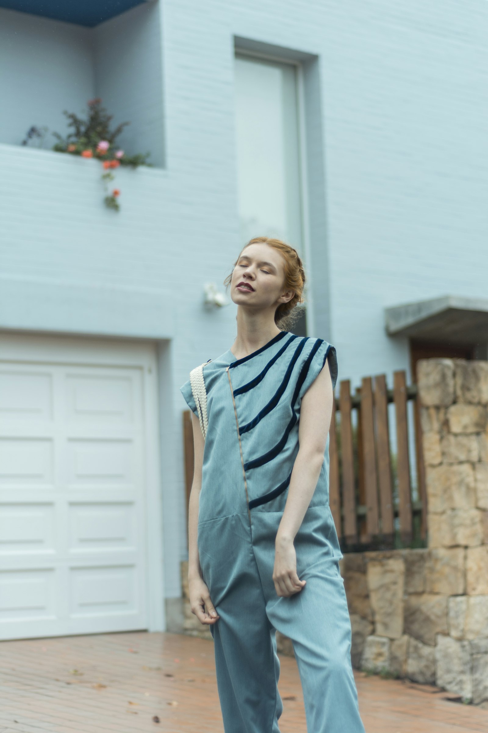 Nikon D5200 + Nikon AF Nikkor 50mm F1.8D sample photo. Woman standing near house photography