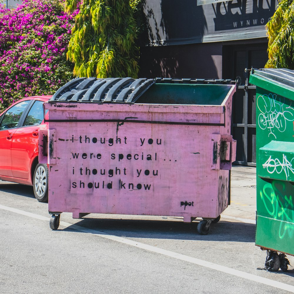 purple and black trashcan