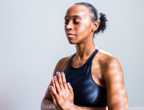 woman wearing black sports bra