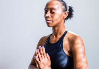 woman wearing black sports bra