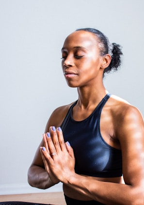 woman wearing black sports bra