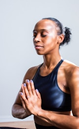 woman wearing black sports bra