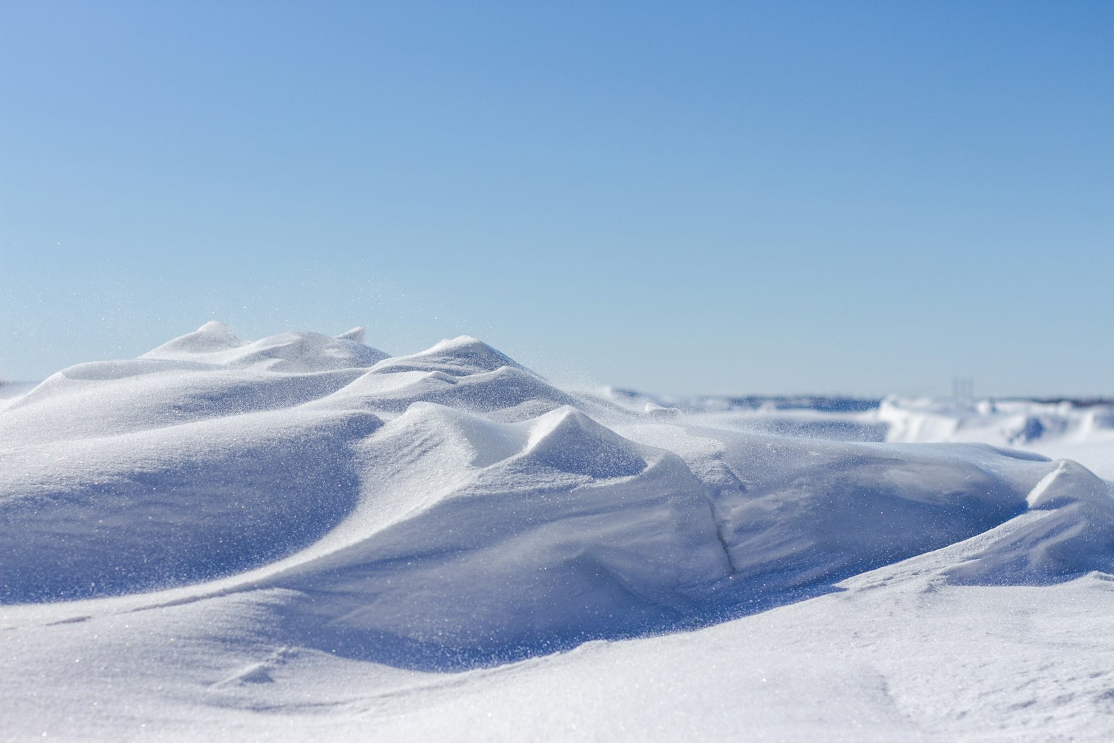 Canon EOS 700D (EOS Rebel T5i / EOS Kiss X7i) + Yongnuo YN 50mm f/1.8 sample photo. White snow during daytime photography