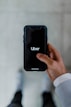person holding black smartphone