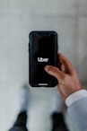 person holding black smartphone