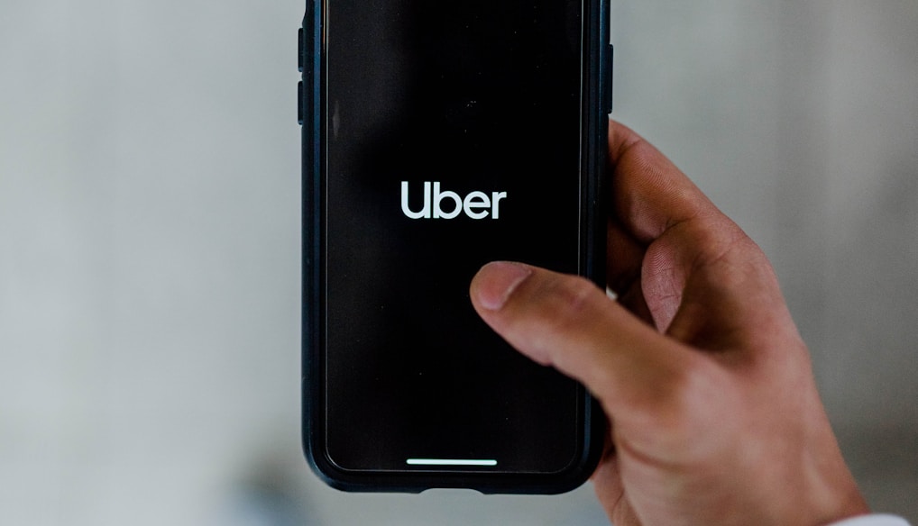 person holding black smartphone