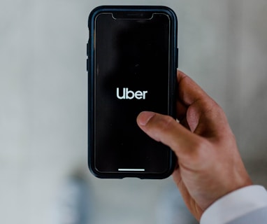 person holding black smartphone