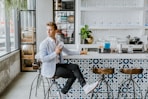 man sitting on stool