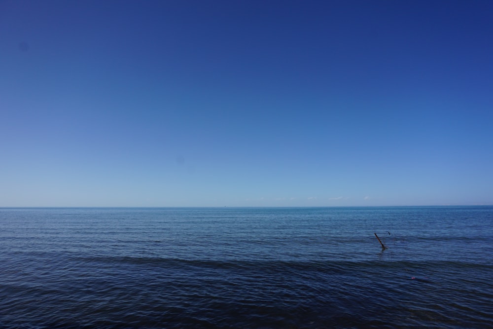 view of ocean water under clear blue sky