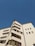 low-angle photography of white high-rise building