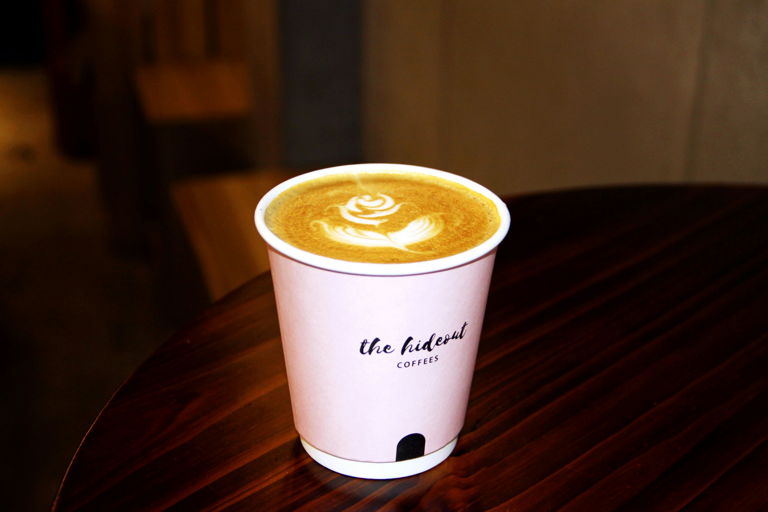 A latte in a ceramic cup