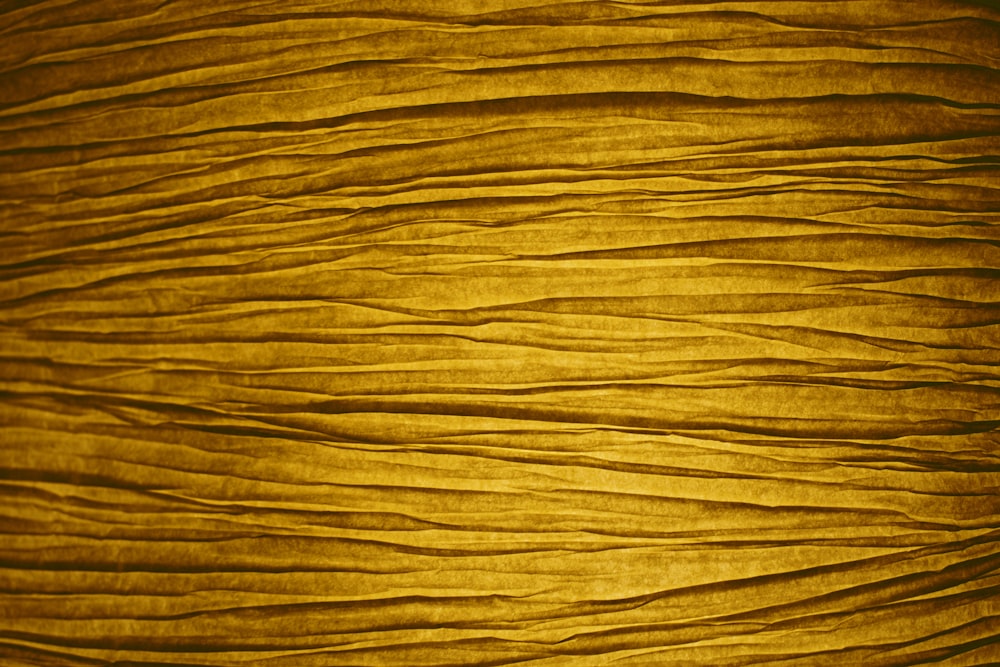 a close up view of a yellow fabric