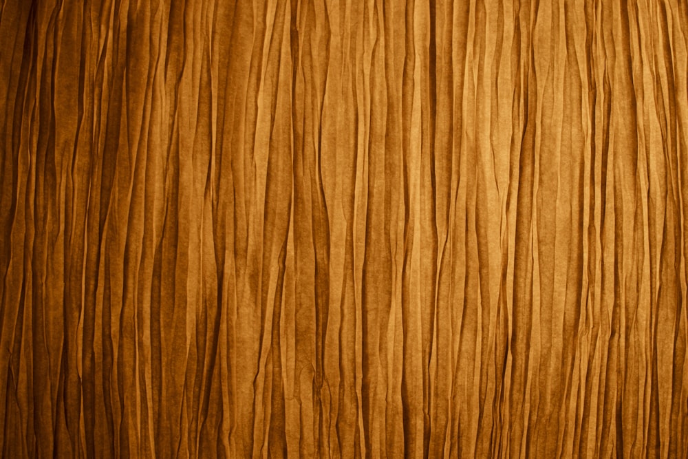 a close up view of a wood grained surface