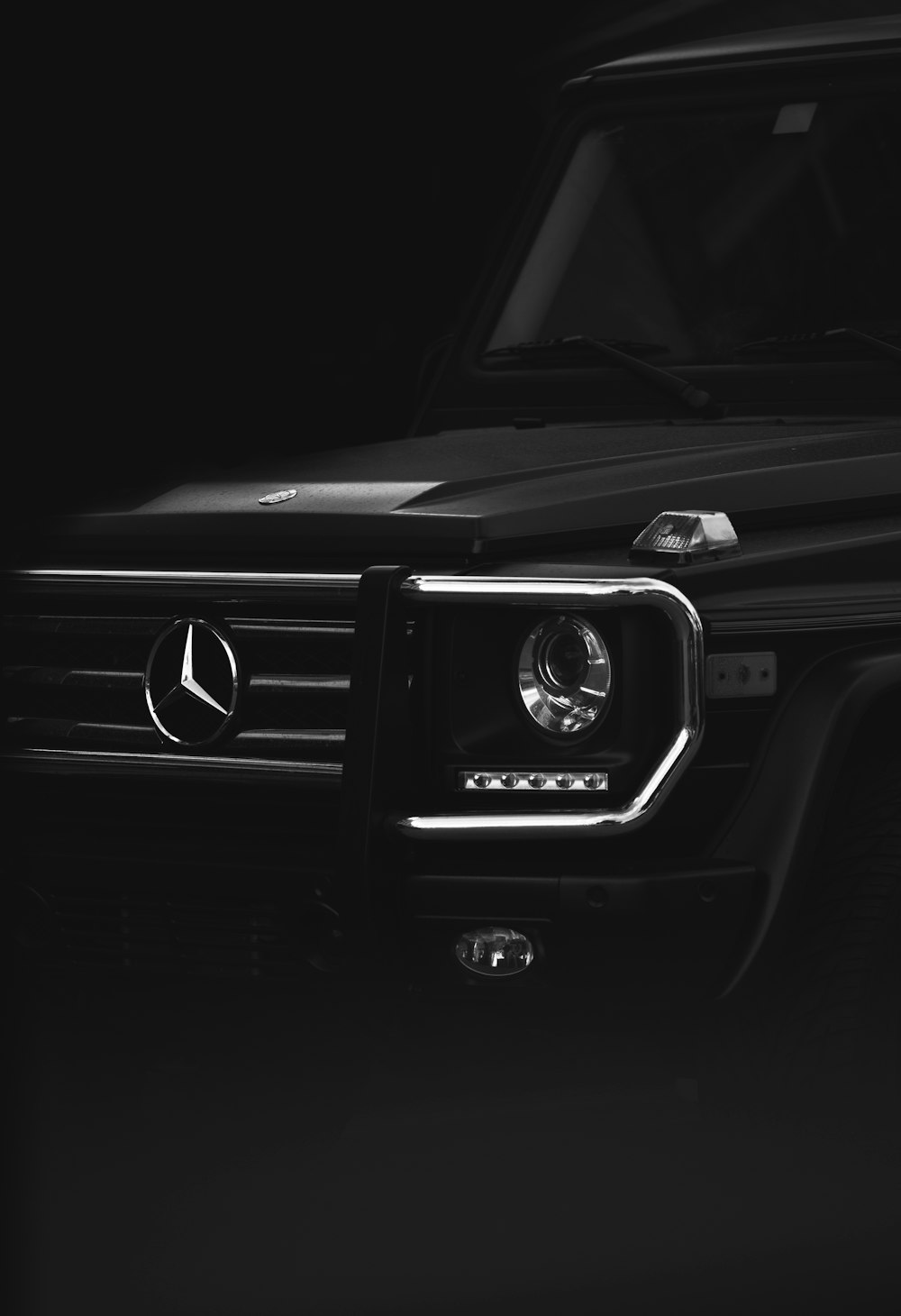 black Mercedes-Benz car