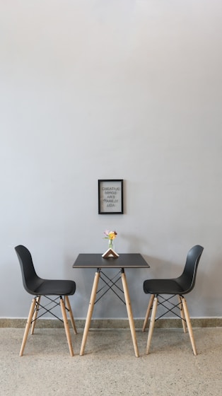 black couple dining set with yellow flower