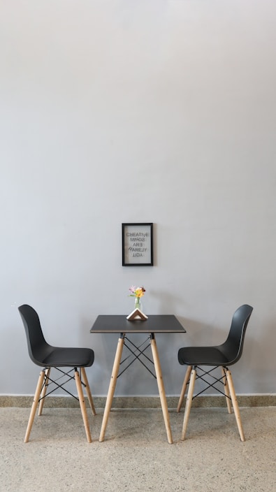 black couple dining set with yellow flower