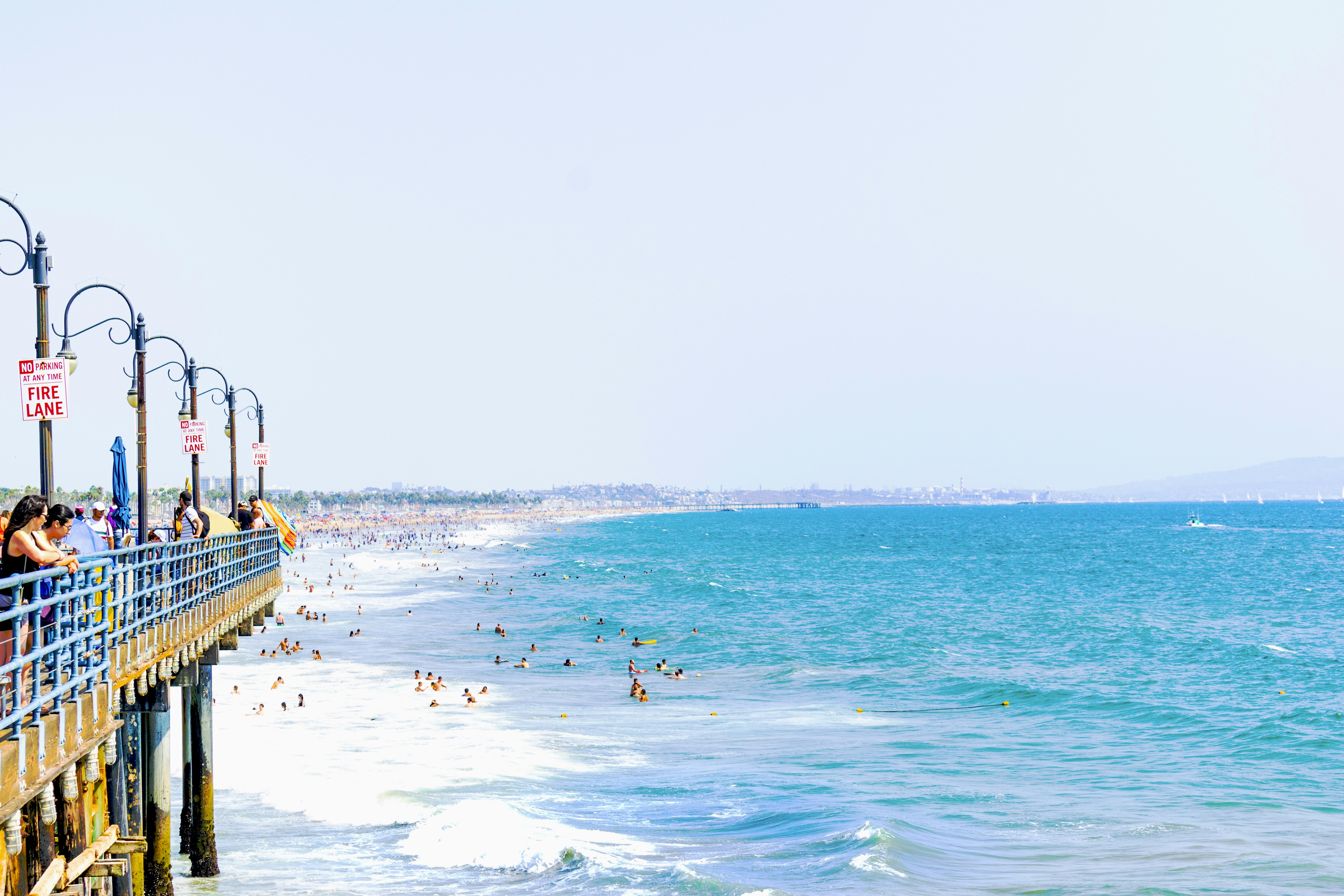 people in ocean during day time