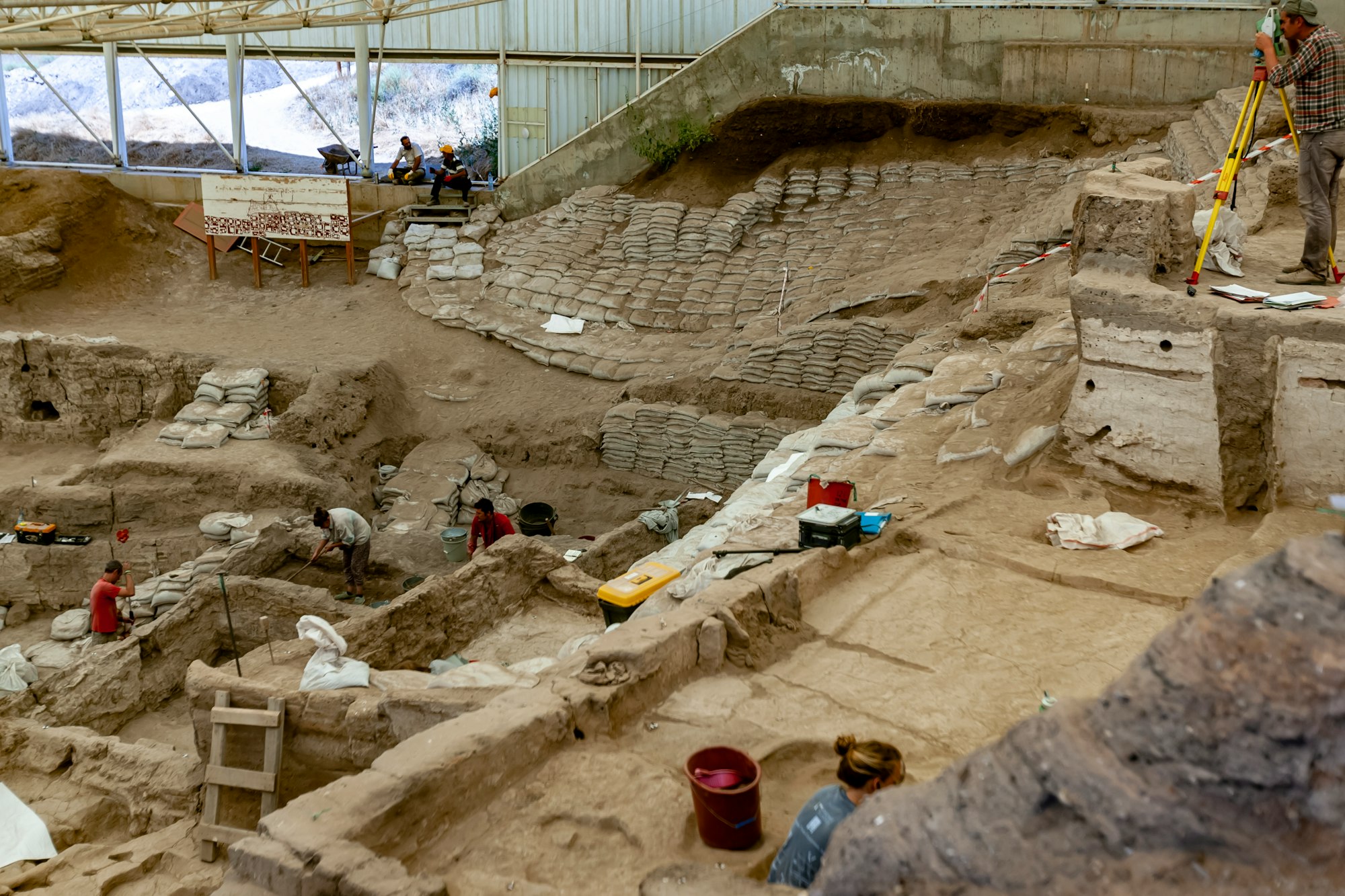 Çatalhöyük was a very large Neolithic proto-city settlement in southern Anatolia, which existed from approximately 7500 BC to 5700 BC, and flourished around 7000 BC. In July 2012, it was inscribed as a UNESCO World Heritage Site.

It is located overlooking the Konya Plain, southeast of the present-day city of Konya (ancient Iconium) in Turkey. The eastern settlement forms a mound which would have risen about 20m above the plain at the time of the latest Neolithic occupation. There is also a smaller settlement mound to the west and a Byzantine settlement a few hundred meters to the east. (Wiki)