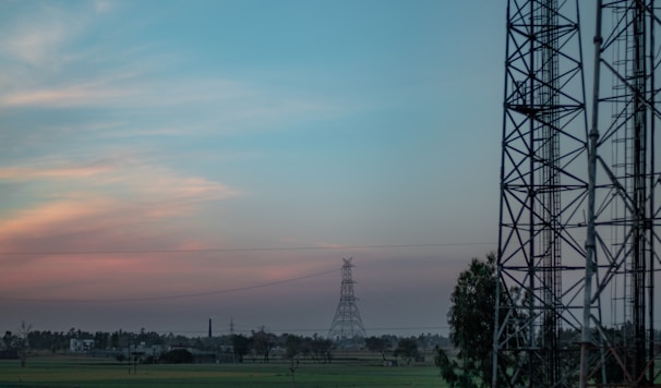 A scenic rural landscape with new internet towers blending into the environment.