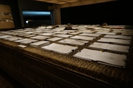Creative sketches and designs displayed on a table.