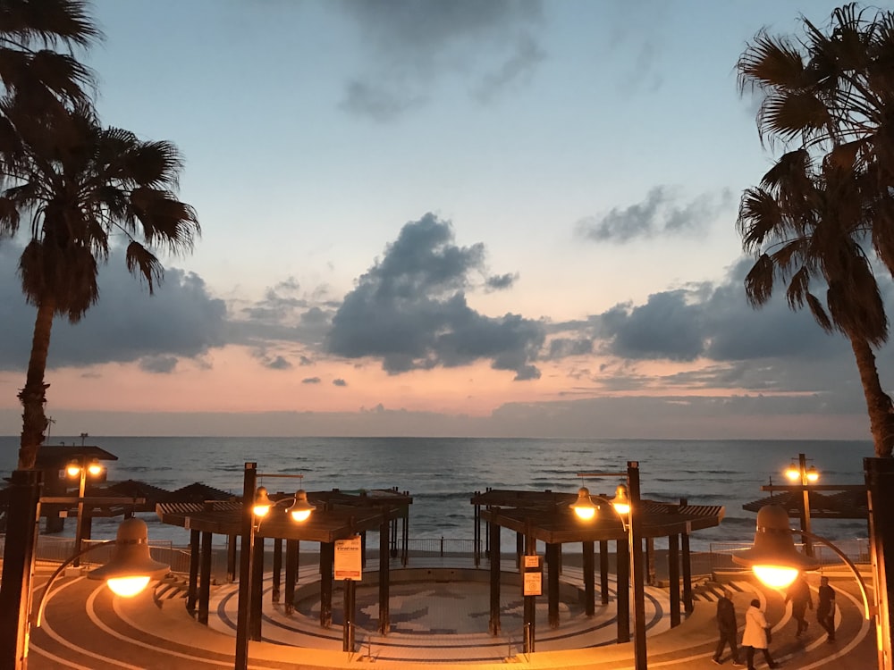 black wooden canopies in beach