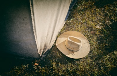 beige cowboy hat close-up photography