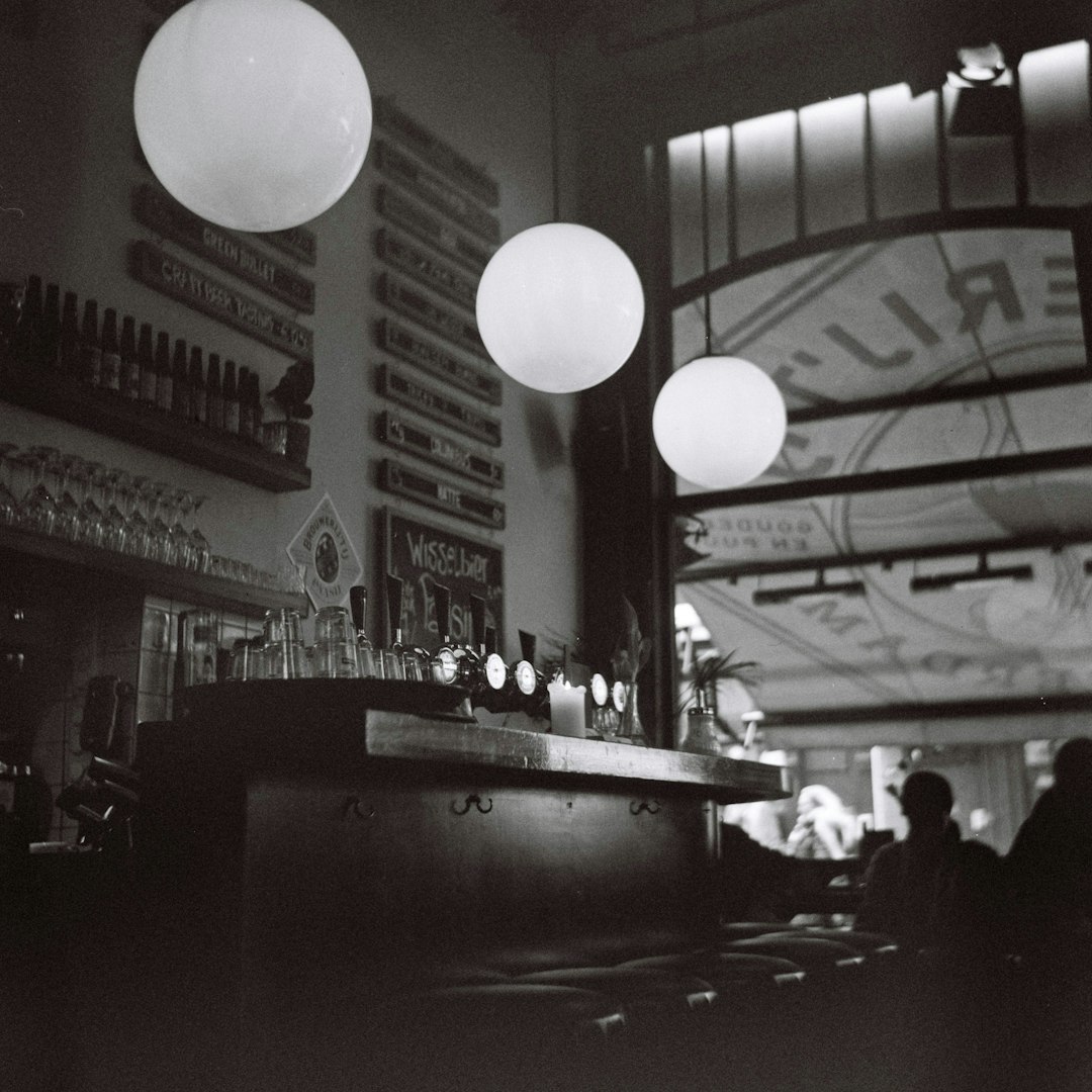 lighted round hanging lamps in bar