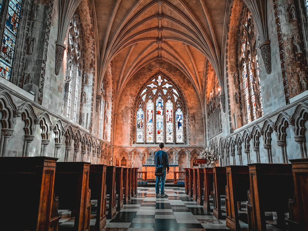 man standing in front of altar of St. Albans Cathedral