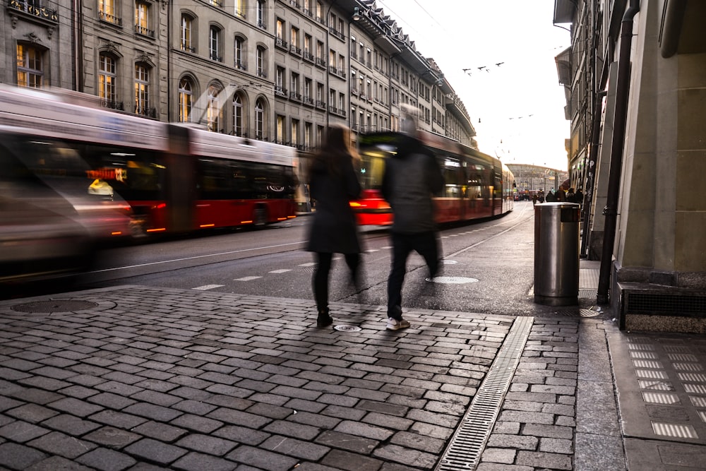 people walking on sidewalk