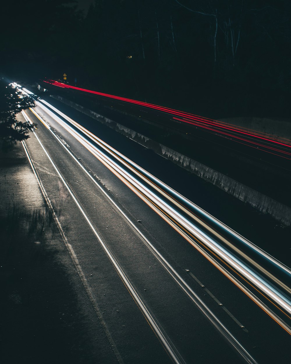 time lapse photography of cars running on road at night