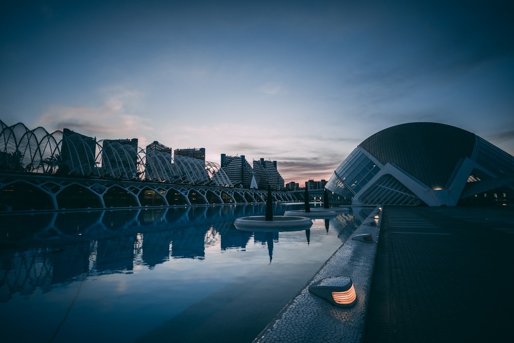 architectural photography of building near body of water