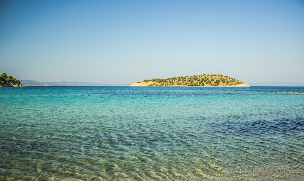 island surrounded by body of water