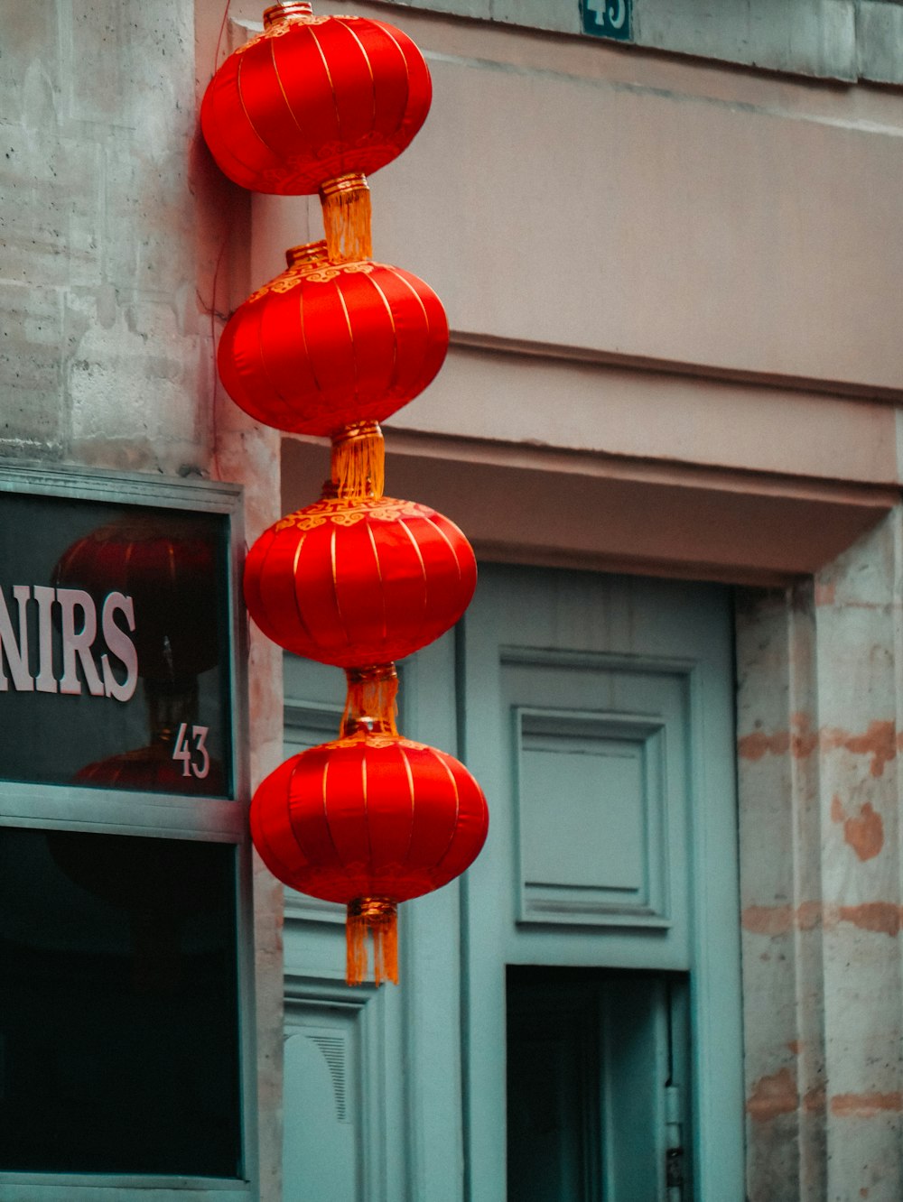 four red paper lanterns