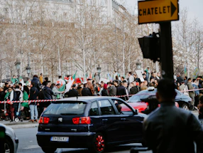 A peaceful crowd gathering at Place de la République, ready to march.