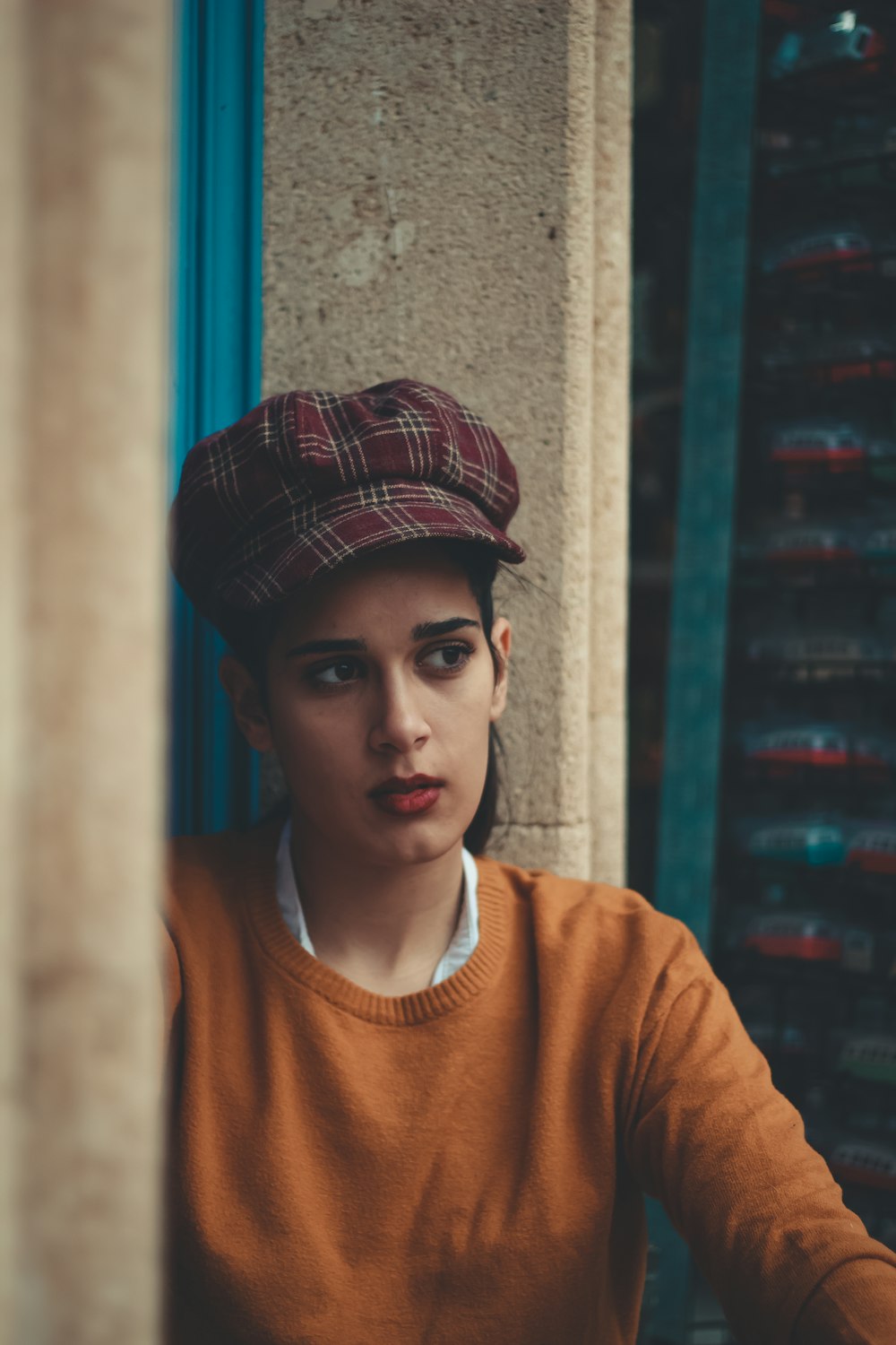 woman in brown crew-neck shirt