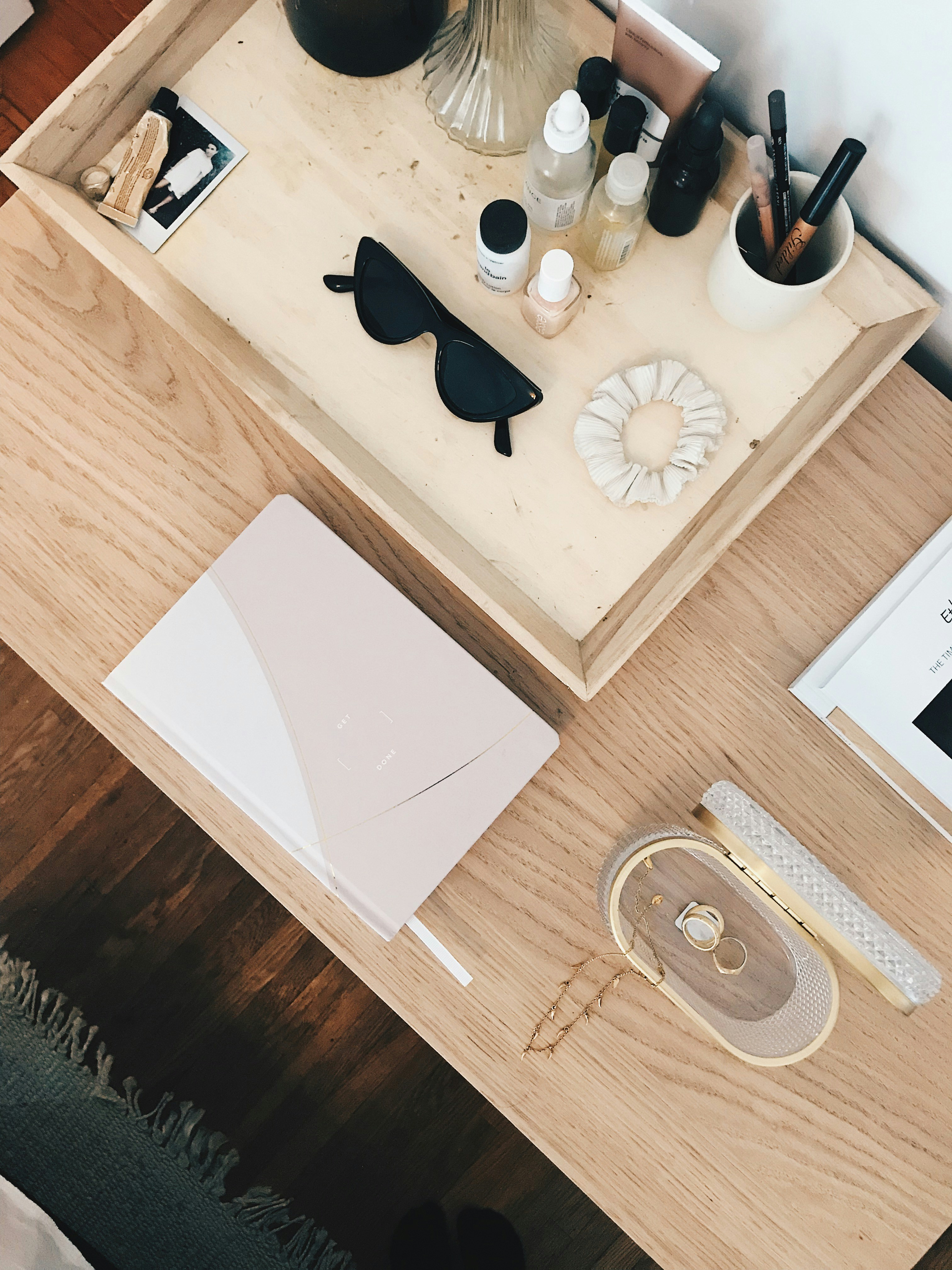 aerial view photography of black sunglasses on top of table