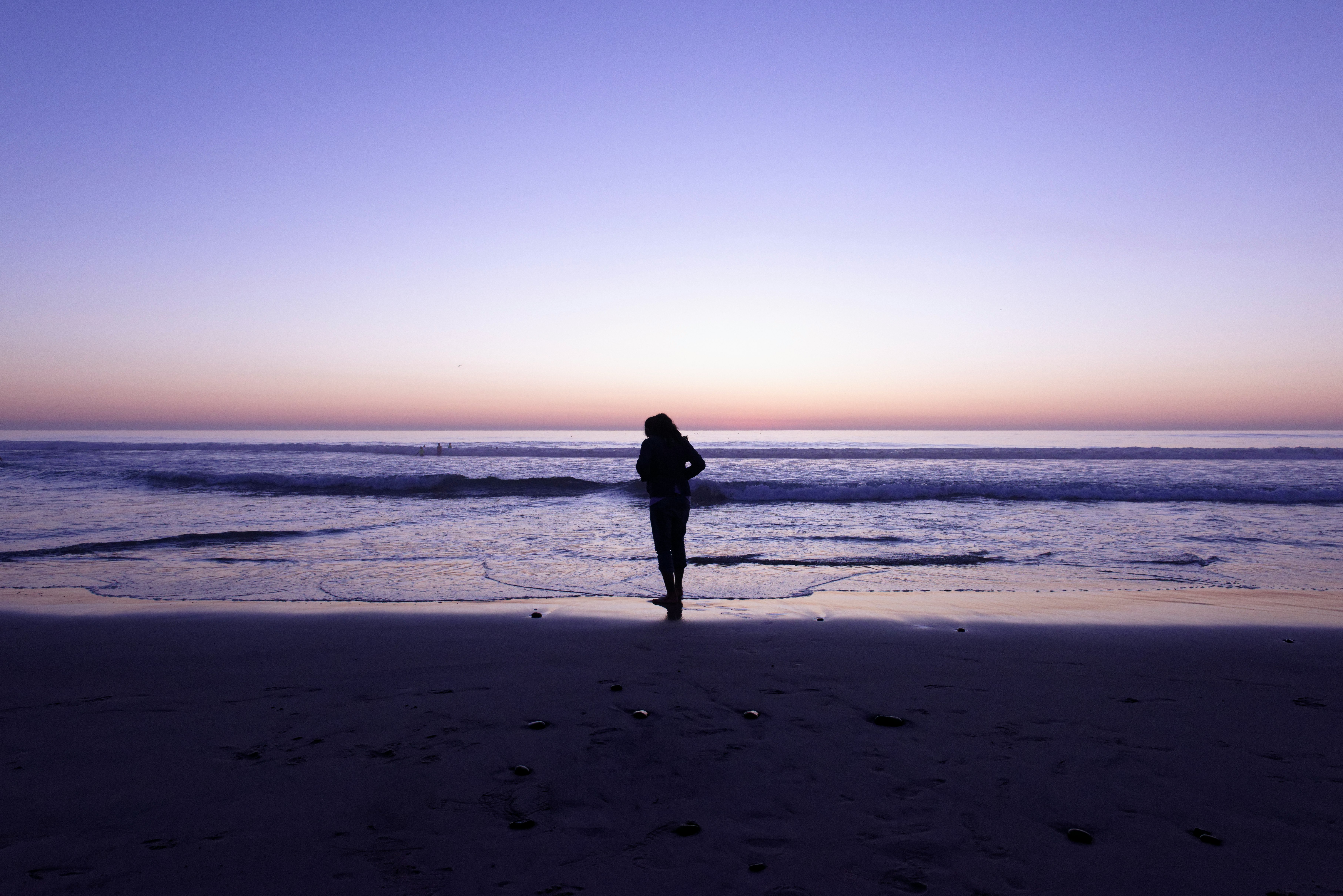 woman standing on seashoe