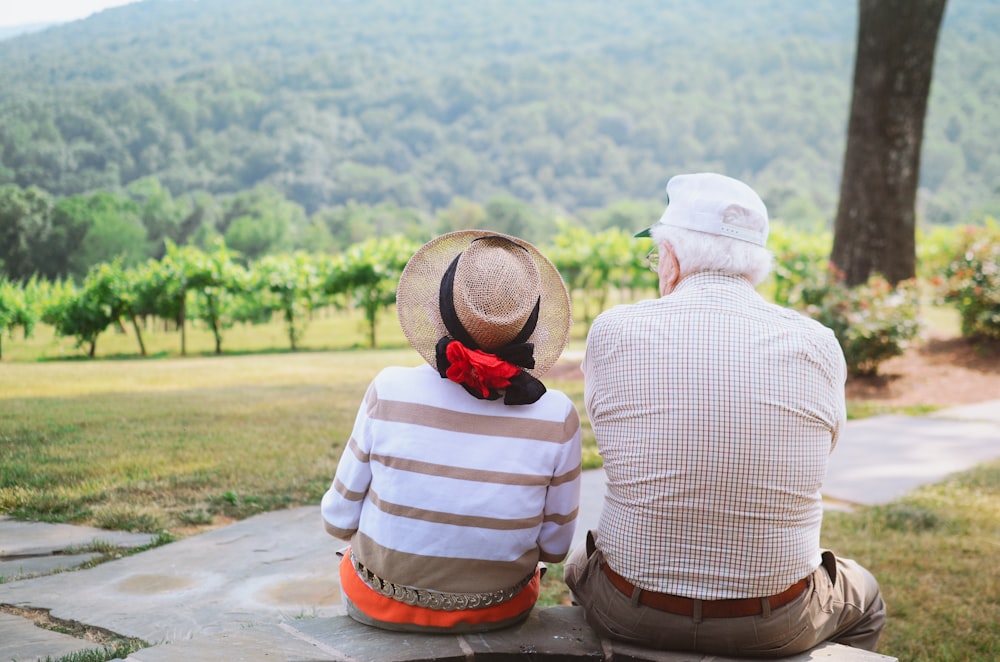 couple sitting on pathway