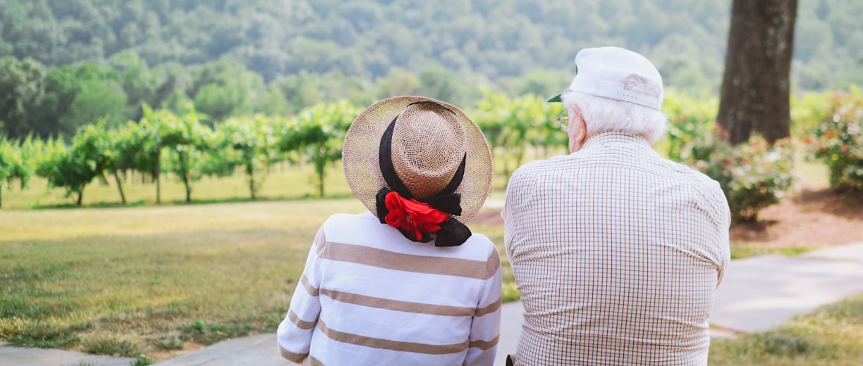 couple sitting on pathway