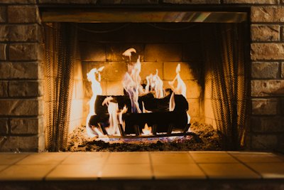 Wood burning fireplace with efficient fire in Seattle area home