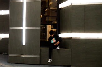 A vibrant urban backdrop with a person lounging on a bench, dressed in Lumina Apparel’s latest activewear set.