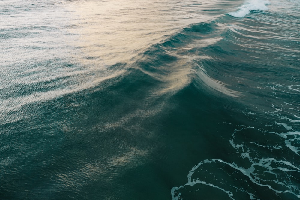 time-lapse photography of blue wave