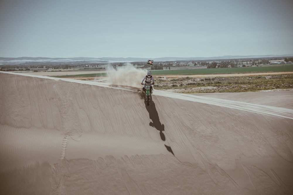 man rising dirt bike