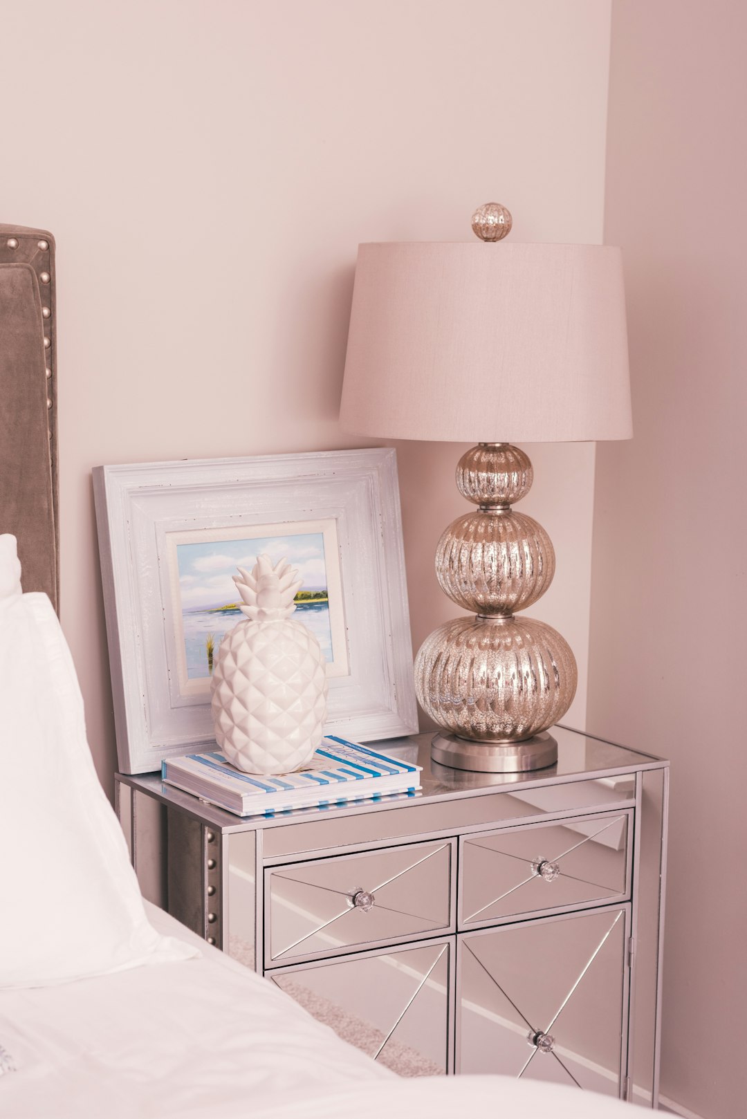 white and silver-colored table lamp