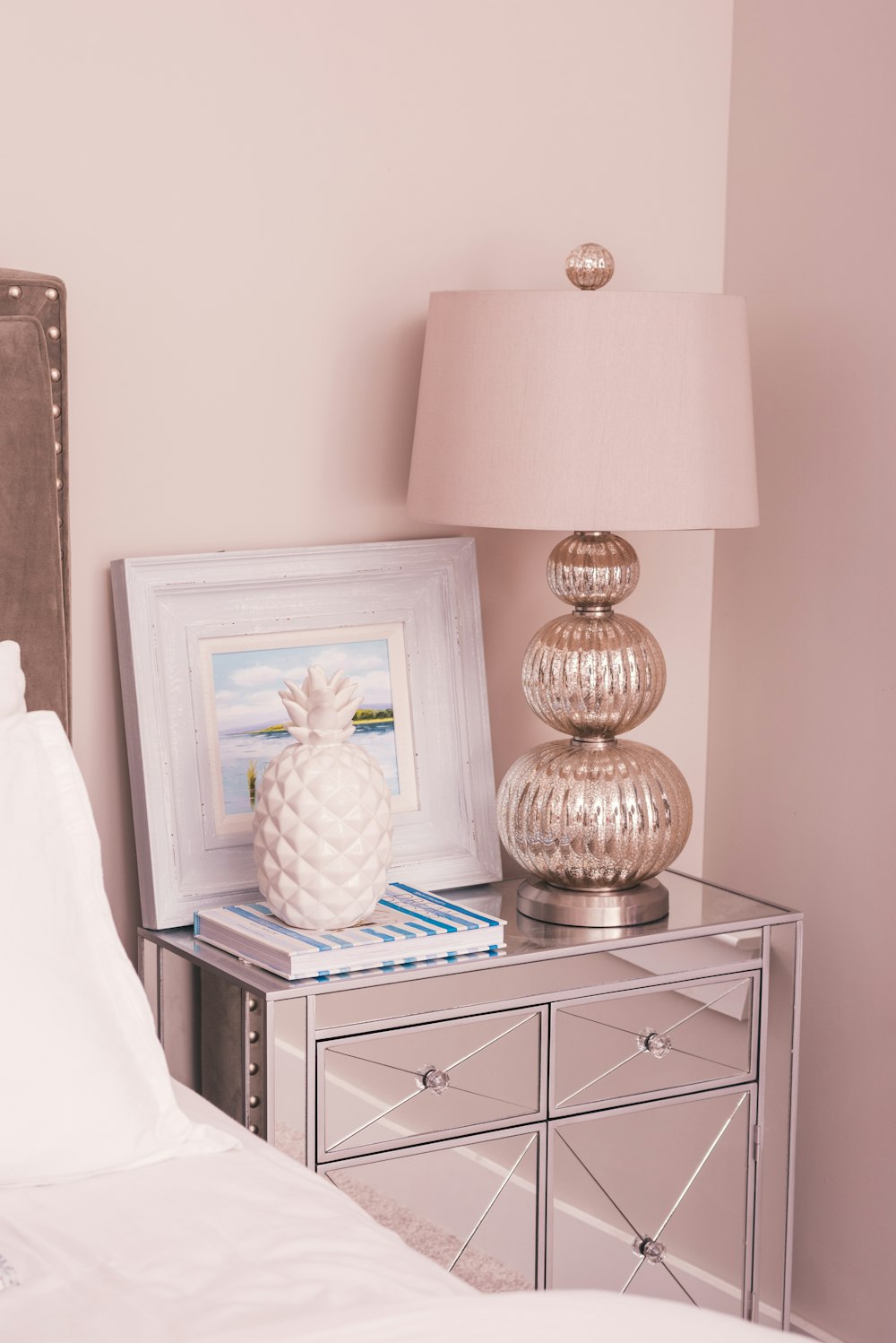 white and silver-colored table lamp