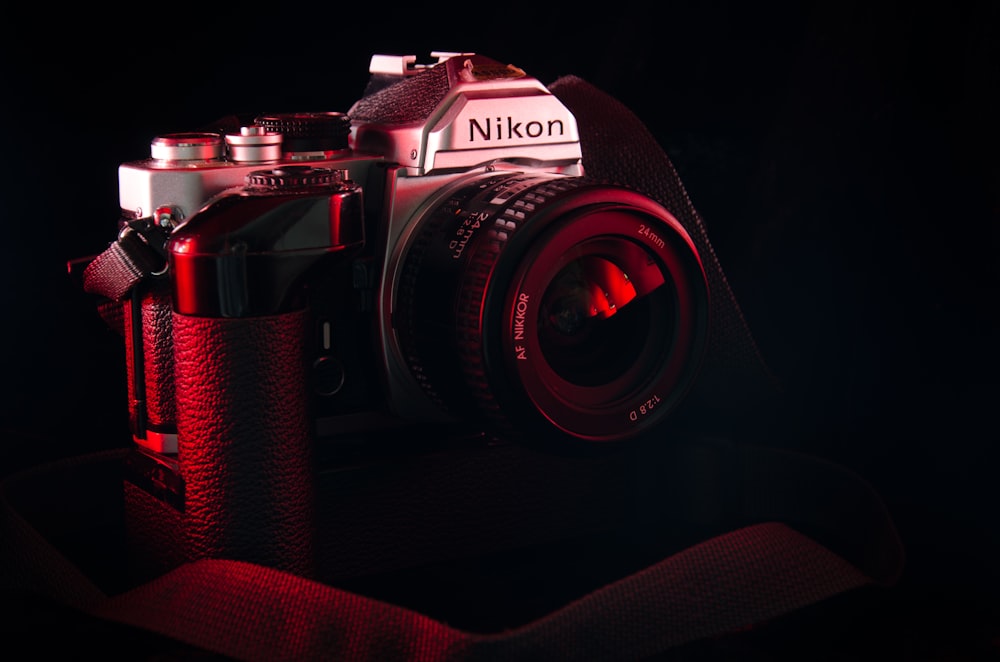 photo of black and gray Nikon DSLR camera
