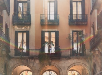 Before and after shots of a weathered exterior transformed by Rainbow Restoration.