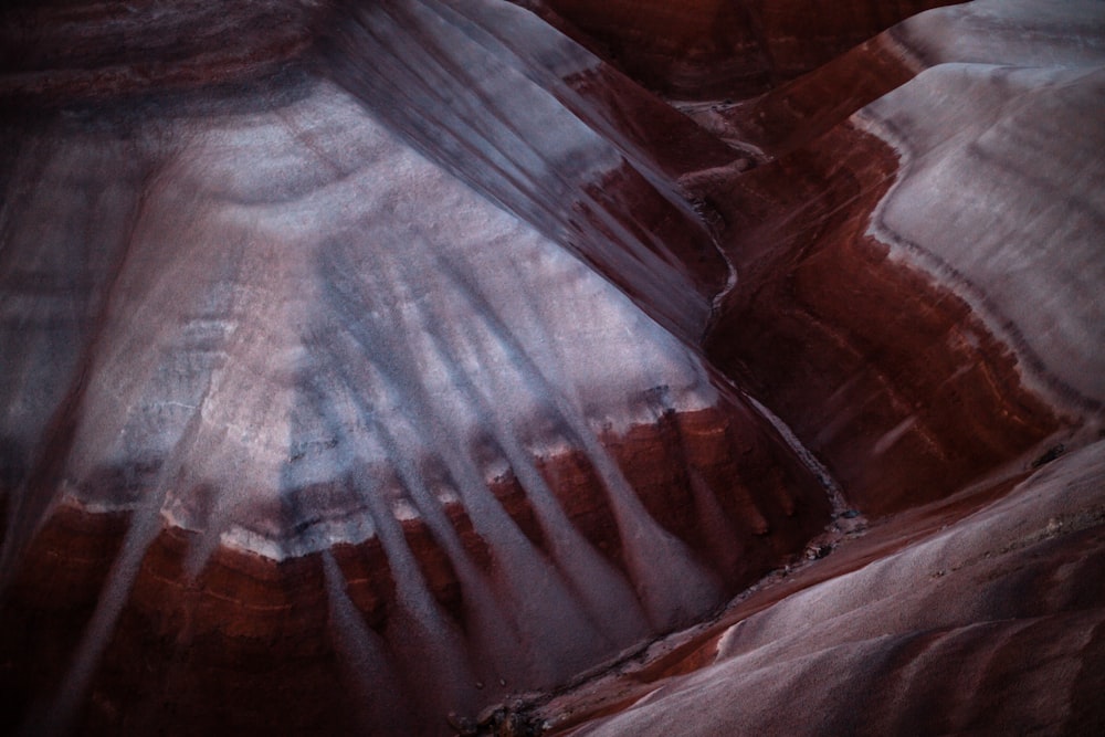 a close up of a rock formation with a sky background