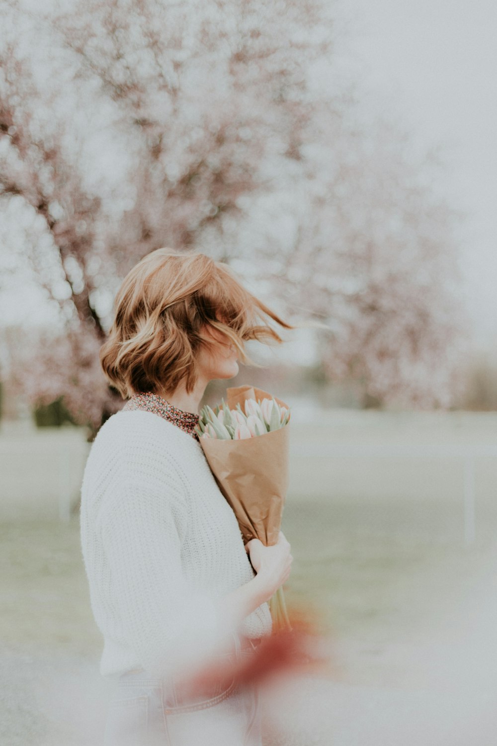 woman holding bouquet flower